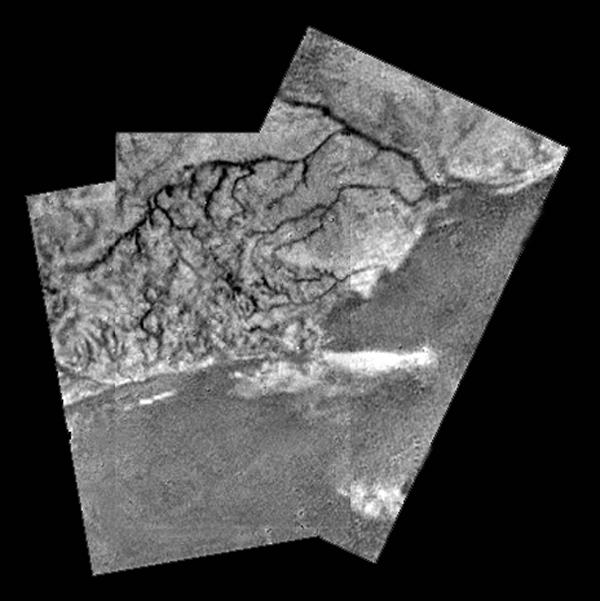 Huygens view of high ridge area with flow down into a major river channel